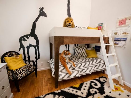 Bunk bed in the interior of a children's room: photos, design ideas