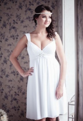 Maternity wedding dresses: a photo of wedding dresses for brides in position