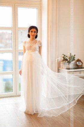 Maternity wedding dresses: a photo of wedding dresses for brides in position