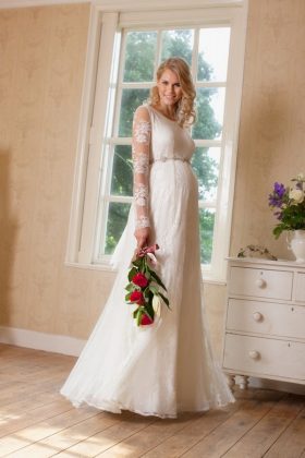 Maternity wedding dresses: a photo of wedding dresses for brides in position