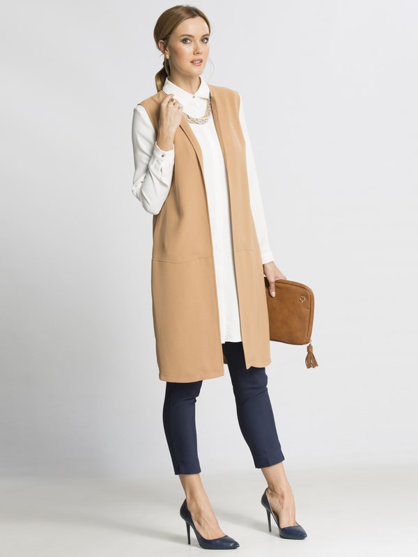 O que vestir em vez de uma jaqueta e uma capa de chuva? Coletes à moda 2019-2020