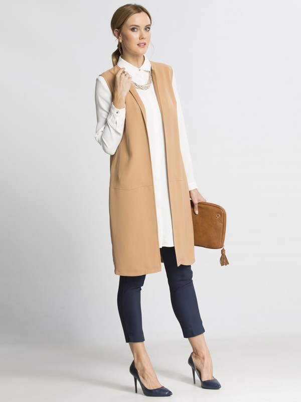 What to wear instead of a jacket and a raincoat? Fashion vests 2019-2020