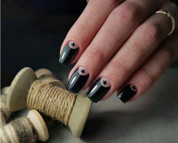 The mystery of black in a fashionable manicure with black polish - photo ideas