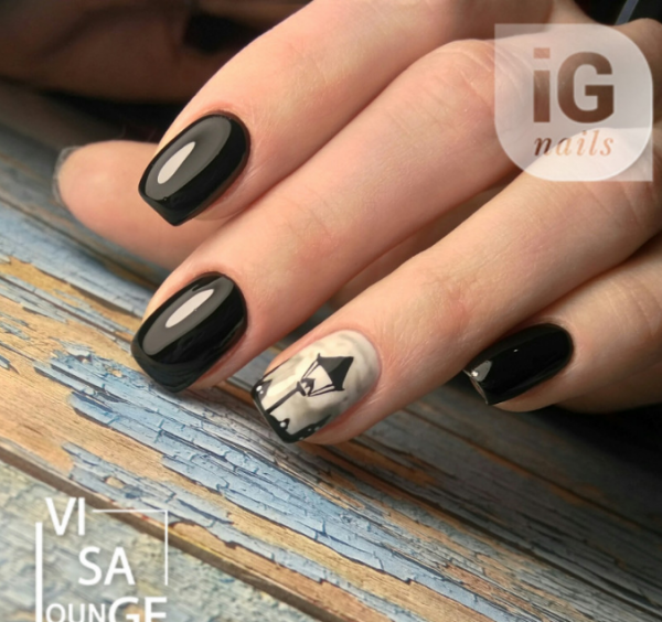 The mystery of black in a fashionable manicure with black polish - photo ideas
