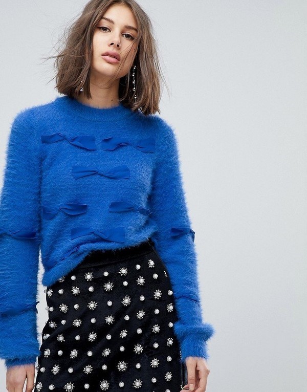 Suéteres de moda para mujer 2019-2020: tendencias, nuevos modelos, fotos de lazos de moda con un suéter